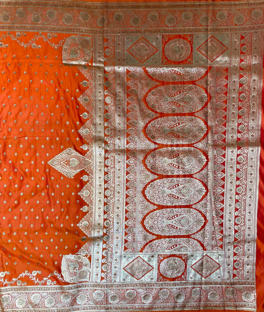 Orange Katan Banarasi Saree with Silver Zari Floral Weaving And Grand Pallu B0646ds