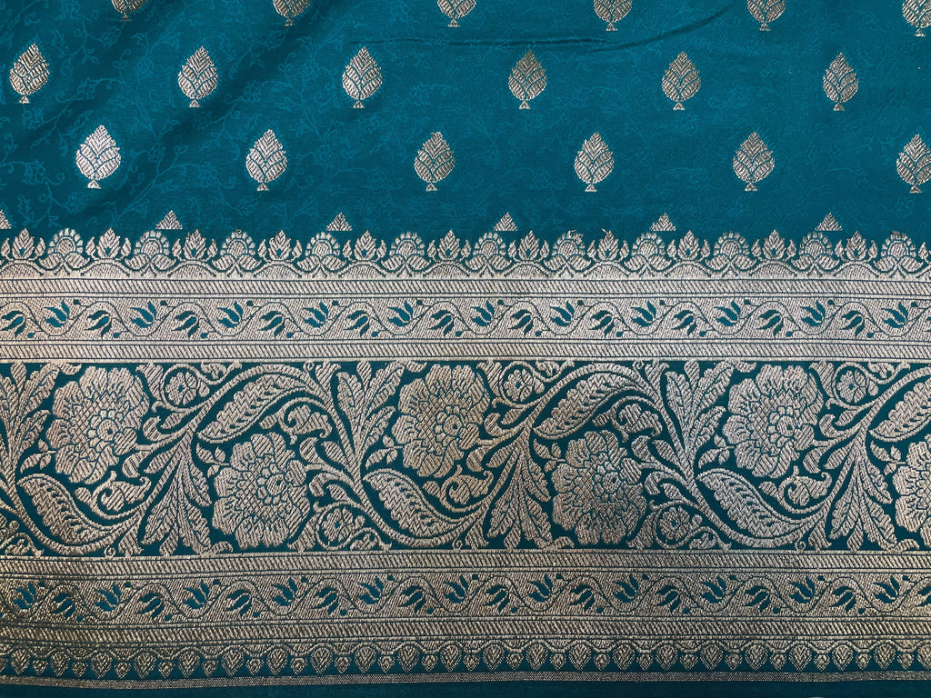 Teal Blue Katan Banarasi Saree with Silver Zari Floral Weaving And Grand Pallu B0589ds