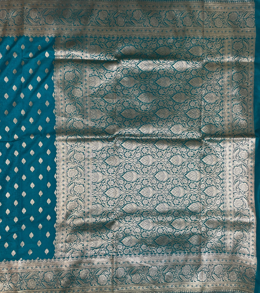 Teal Blue Katan Banarasi Saree with Silver Zari Floral Weaving And Grand Pallu B0589ds