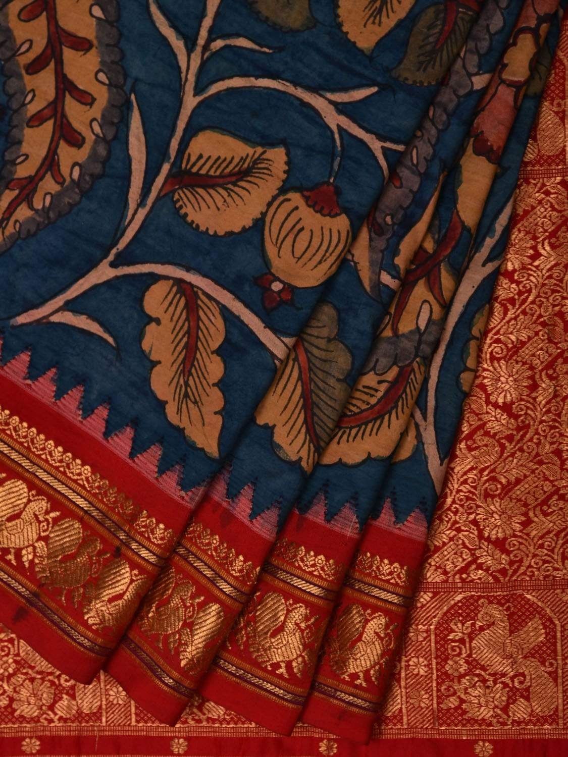 Gorgeous Raw silk blue saree with Kalamkari hand painted border and de –  Sujatra